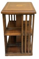 An Edwardian mahogany and satinwood inlaid revolving bookcase, top measures 47 x 47cm, height 84cm.