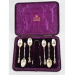 CHARLES EDWARDS; a set of six Victorian hallmarked silver figural tablespoons, the tops surmounted