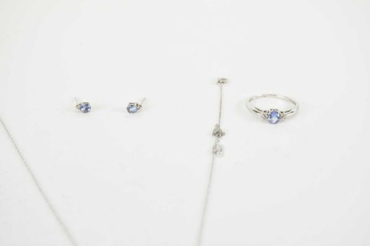 A suite of 9ct white gold white and blue stone set jewellery comprising a ring, size P, necklace and - Image 2 of 2