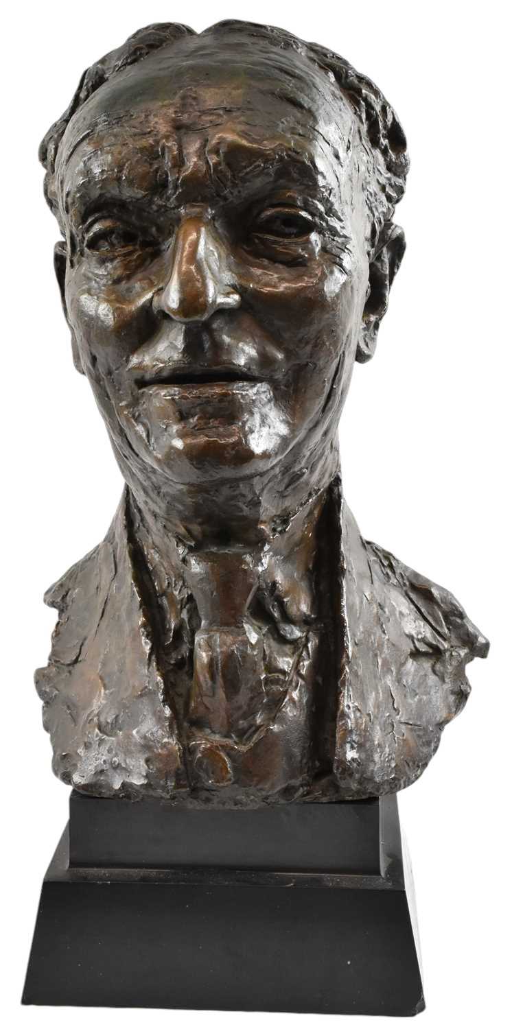 † SIR JACOB EPSTEIN (1880-1959); a bronze portrait bust of a gentleman, raised on black marble