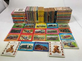 A collection of children's books including Noddy, Thomas the Tank Engine, Ladybird books, Rupert