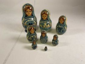 A good set of eight Russian wooden dolls from 1994.