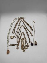 A group of jewellery including rope twist chains stamped 375 or 9k, approx 36g, a seed pearl