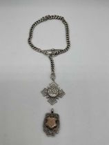 A silver graduated Albert chain, with boxing fob, dated 1881, and a further fob, combined approx 2.