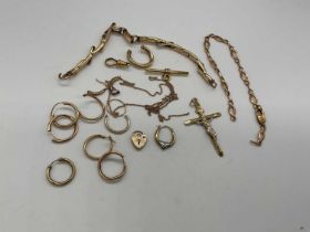 A group of damaged 9ct yellow gold and yellow metal jewellery including a watch strap with