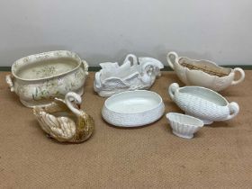 A quantity of decorative ceramic planters including Brannam Pottery, Arthur Wood and other