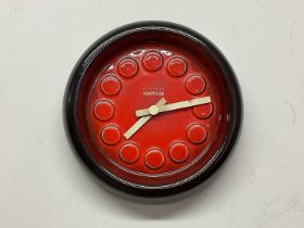 A Kienzle Boutique West German pottery wall clock, diameter 27cm.