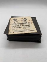 MICKEY MOUSE; a set of eight Ensign Ltd lantern slides, 'Traffic Troubles', with original paper