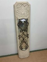 A decorative metal and resin garden mirror, width 34cm, height 152 cm.