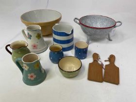 KITCHENALIA; a group of items including a mixing bowl, a Cornishware jug, a French colander etc.