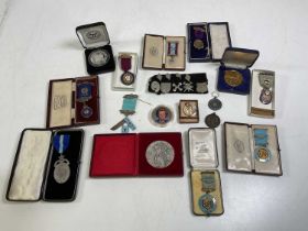 A collection of Masonic and Boys Brigade items including medals, badges, coins etc.