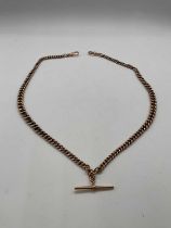 A 9ct rose gold double Albert fob chain with central T- bar, length 57cm, approx 66g.