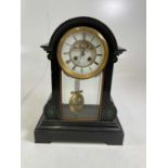 A slate mantel clock, height 48cm, width 36cm, depth 20cms.