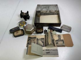 A miscellaneous lot of collectors' items including two foreign postcard albums, fountain pen and tin