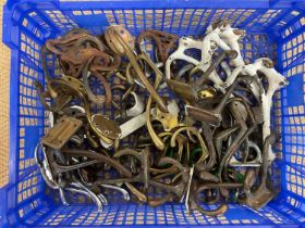 A quantity of various brass and chrome coat hooks.