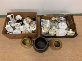 A collection of ceramics and three stoneware pots.