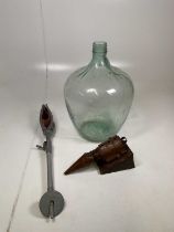 A vintage glass carboy, height 55cm, a vintage bee smoker and a vintage Featherwate shooting