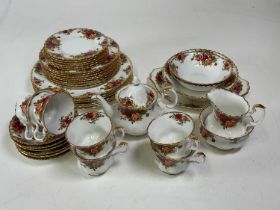 ROYAL ALBERT; an 'Old Country Roses' pattern tea set with part dinner service.