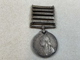 A Victorian Queen's South Africa medal awarded to 64413 B.O.M. Sgt G. Johnson. R.F.A. with five bars