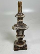 A 19th century Continental (possibly Italian) carved wood gesso painted candlestick, height 39cm.