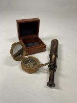 A reproduction cased Natural Sine brass compass marked 'Stanley, London' and a reproduction brass