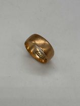 An 18ct yellow gold wedding band, size N 1/2, approx 6.3g.