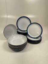 A quantity of Denby Imperial Blue including six bowls, five dinner plates and six breakfast plates.