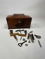 An early Victorian rosewood sarcophagus tea caddy, with two internal lidded compartments and sold