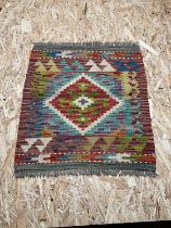 A Chobi Kilim rug, 45 x 50cm.