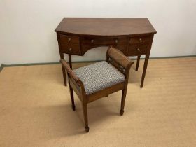 A 19th century mahogany dressing table/desk with bowfront, 80 x 112 x 60cm, and a piano stool with