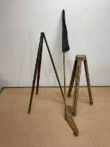 A US Army Signal Corps tripod made by the Eastern Company in Cambridge Massachusetts, and an early