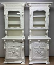 WILLIAM WHITELEY LTD OF LONDON; a pair of painted bookcase cabinets, the upper sections each