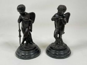 AFTER AUGUSTE MOREAU; a pair of bronze putti (Cupid) figures leaning on their bows, mounted on a