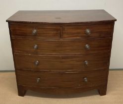 A mahogany bowfronted chest of two short over three long drawers, height 108cm, width 123cm, depth