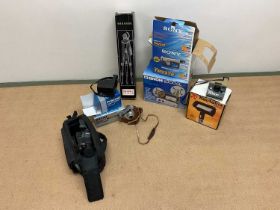 A collection of photographic equipment including cameras, tripod and others plus a Super 8 movie