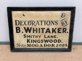 A framed hand painted sign for B. Whitaker Decorations, 43 x 59cm.