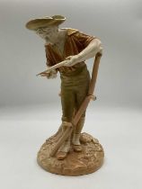 ROYAL WORCESTER; a figure of a young man sharpening a scythe, on naturalistic integral base, green