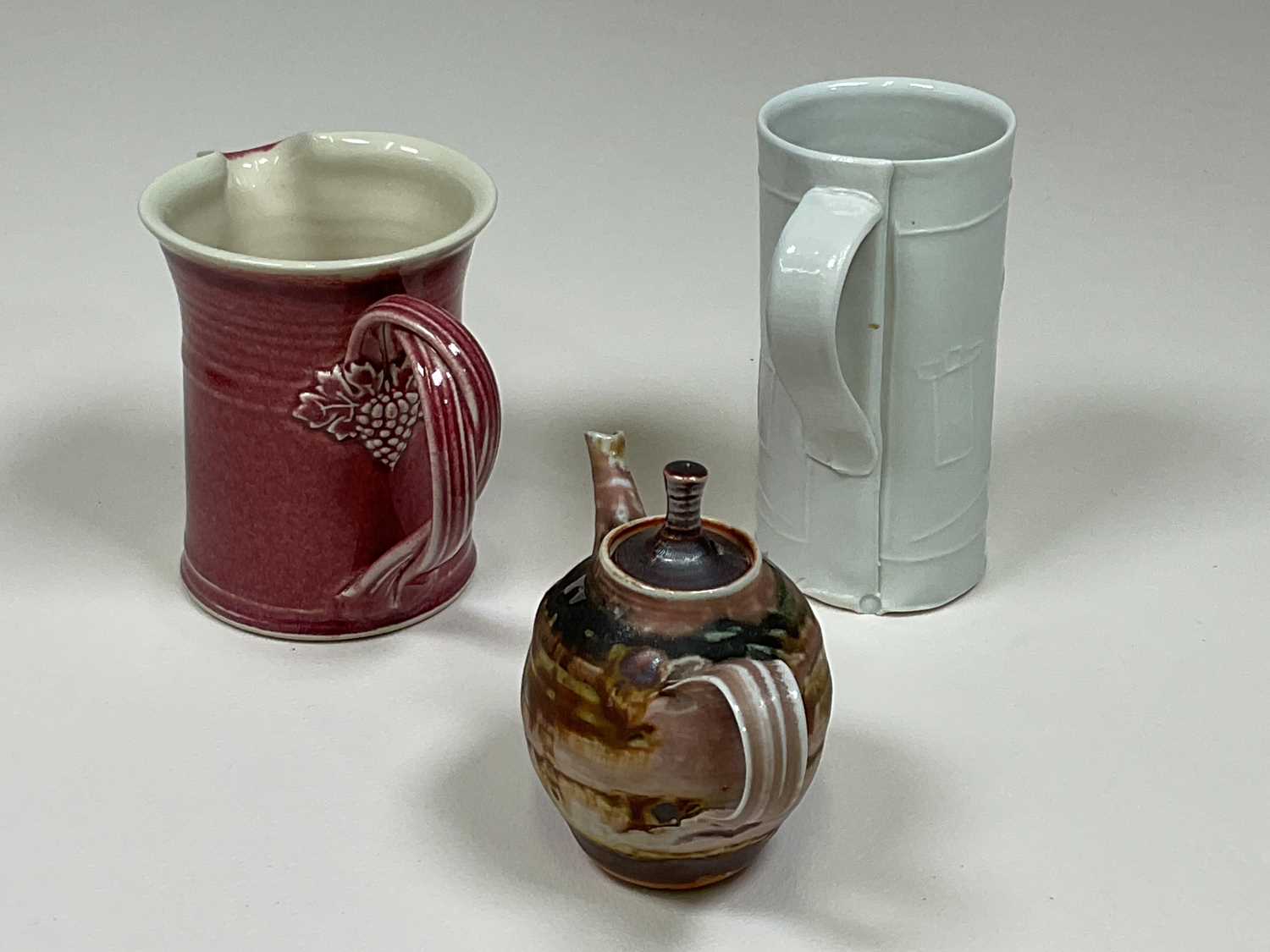 † A small group of studio ceramics including a Clive Bowen slip glaze decorated vessel and cover, - Image 13 of 14