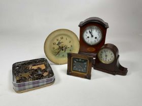 A collection of clocks including a Smiths flying ducks tin plate wall clock, a Smiths wooden