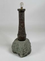 A Cornish serpentine lamp base modelled as a lighthouse set upon a granite base, height 41cm.