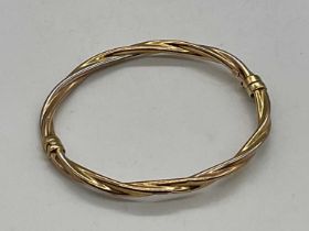 An Italian 9ct yellow gold hinged bangle of rope twist design, internal width 62mm, approx 6.8g.