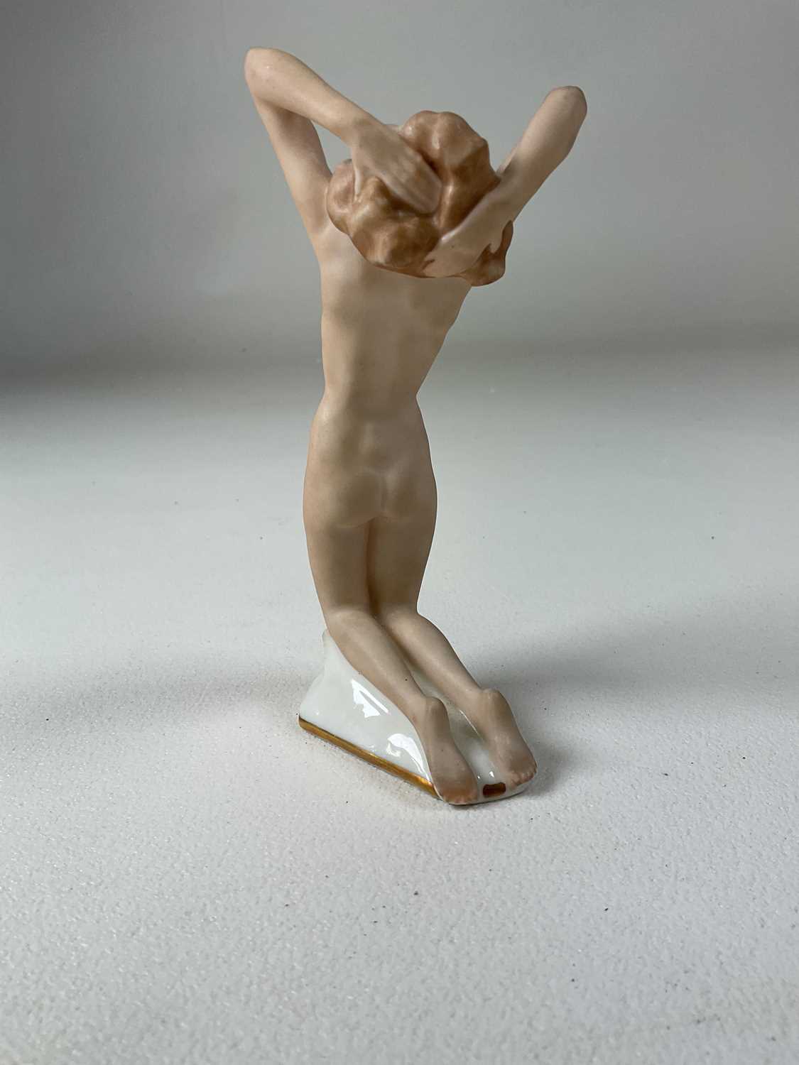 A German Hutschenreuther porcelain figure of a female nude kneeling with her arms and back - Image 4 of 4