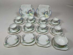 An Art Deco Shelley extensive part tea set, decorated in an Art Deco style with arch with flowers