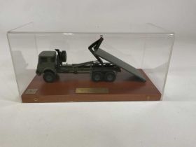 A precision model of a prototype military vehicle, given to a Royal Marine test driver at Commando