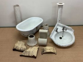 Various garden and architectural items to include a child's roll top enamel bath, a porcelain corner