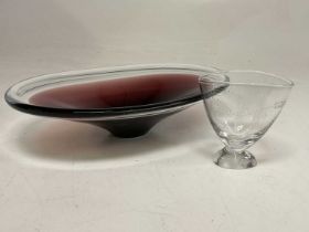 KOSTA BODA; a 'Wheatsheaf' glass vase, height 11cm, and an oval aubergine and clear glass dish,