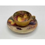 ROYAL WORCESTER; a fruit painted cup and saucer decorated with blackberries and apples. Saucer