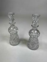 A pair of cut glass thistle shaped decanters and stoppers, height 32.5cm.