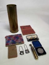 An interesting group of collectors' items including a brass shell case, a small casing converted