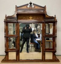 An Edwardian rosewood and inlaid overmantel mirror, the central section with bevelled glass